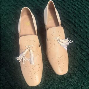 Elegant Beige Leather Loafers with Cream colored Heel and Tassels.